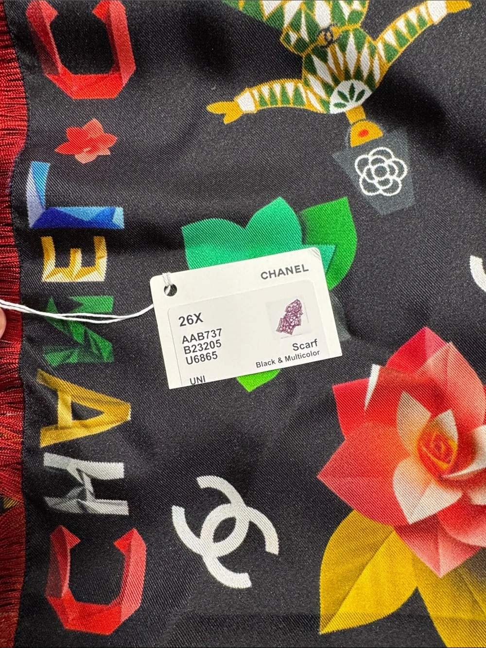 CHANEL Black Floral Logo Silk Scarf with Red Fringe